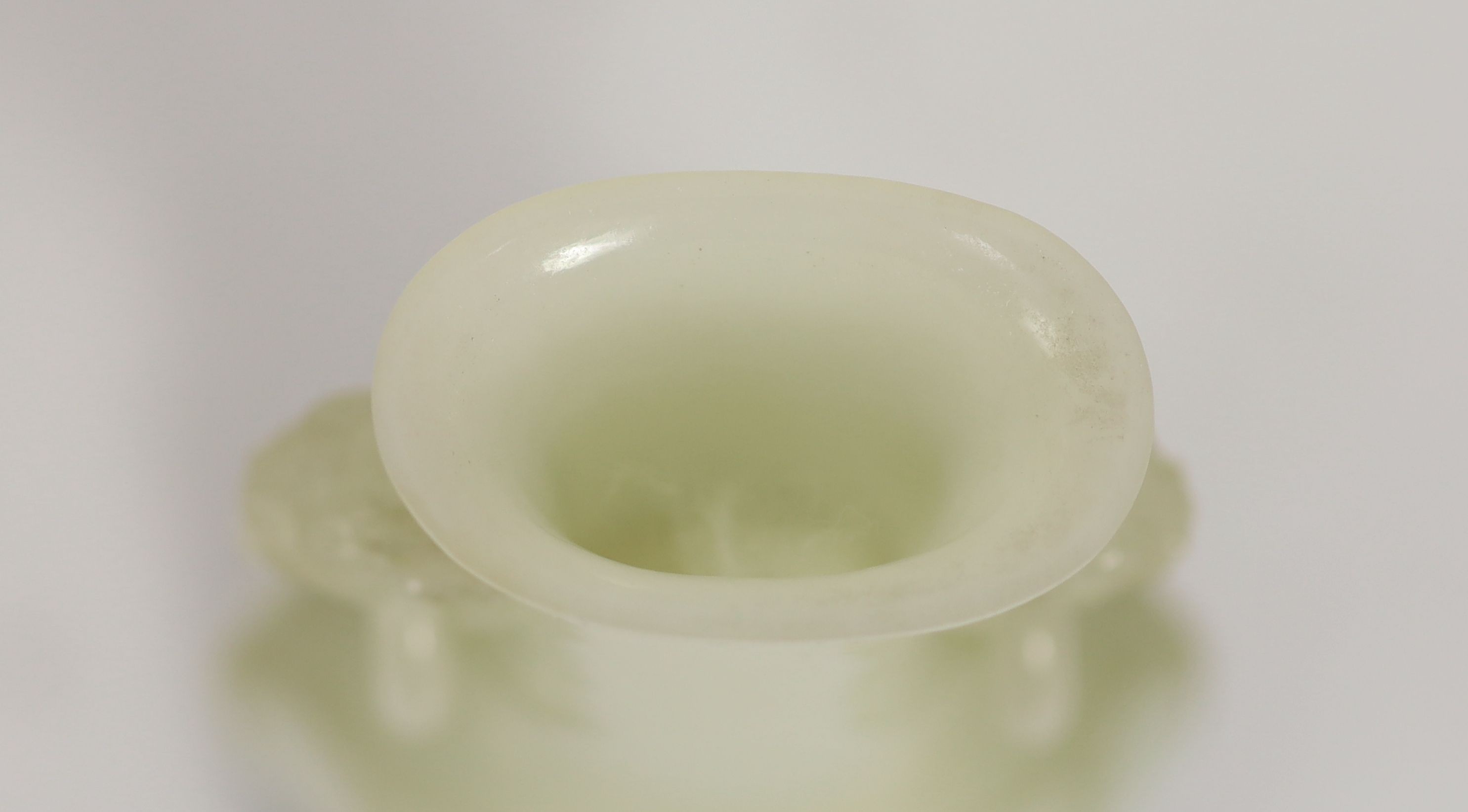 A fine Chinese pale celadon jade ‘rope twist’ vase, Qing dynasty,